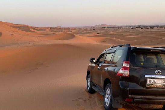 4x4 Vehicles Driving Across Erg Chebbi Merzouga