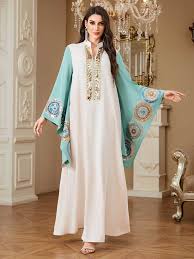 Discover the timeless elegance of a Muslim Kaftan Dress