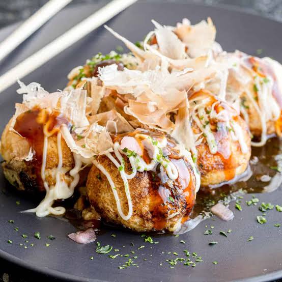 Japanese cuisine are through local favorites such as takoyaki