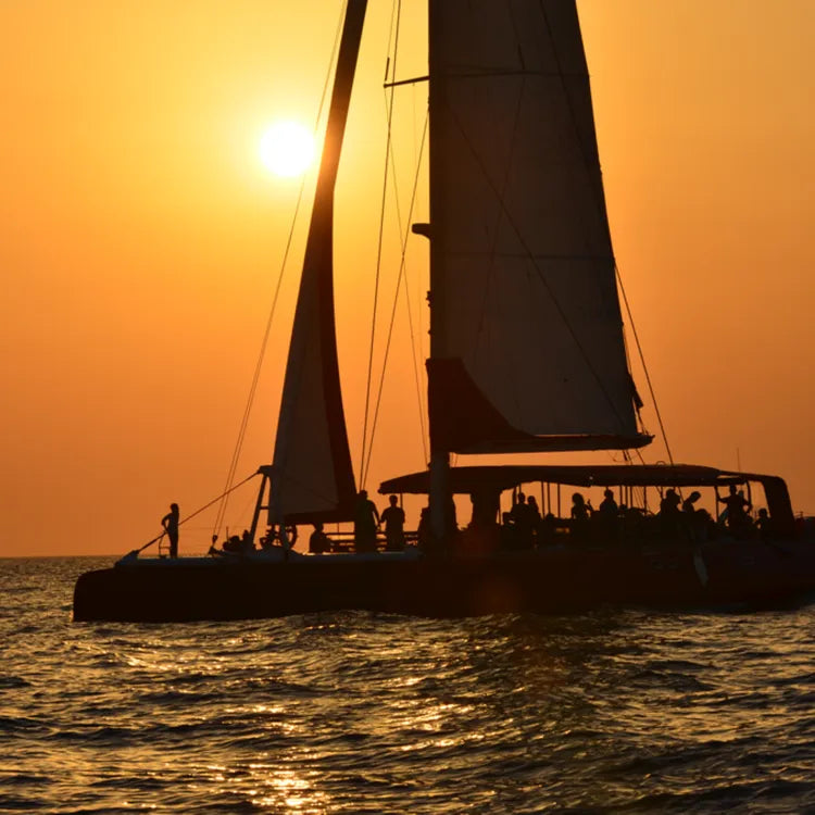 Santorini luxury catamaran sunset cruise with yacht BBQ and drinks