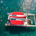 Santorini luxury catamaran sunset cruise with yacht BBQ and drinks