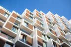 Barcelo Anfa Casablanca hotel with modern white facade, geometric balconies, and warm wood-look panels