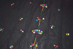 Black cotton and wool Berber Scarf Embroidery with colorful geometric and tribal motifs scattered evenly across the fabric.