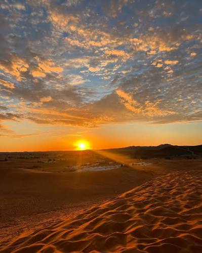 Merzouga sunrise Sahara Desert camel trekking