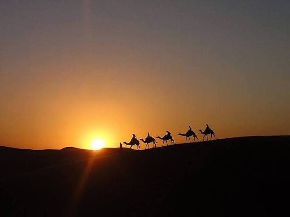 Merzouga sunrise Sahara Desert camel trekking