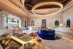 La Mamounia Marrakech elegant circular buffet setup with marble floors, blue central island, and ornate Moroccan decor