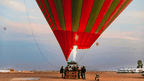 Marrakech by air hot air balloon with red and olive striped canopy and wicker basket