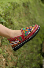 Merzouga Shopping handmade Moroccan Berber leather moccasin in red with multicolored embroidered geometric patterns and black sole