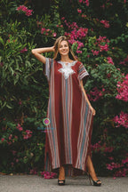 traditional Moroccan kaftan in brown cotton fabric with multicolored vertical stripes and white silk embroidery on the chest